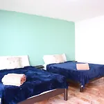 2 Stories, Partial View, 3 Queen Beds
