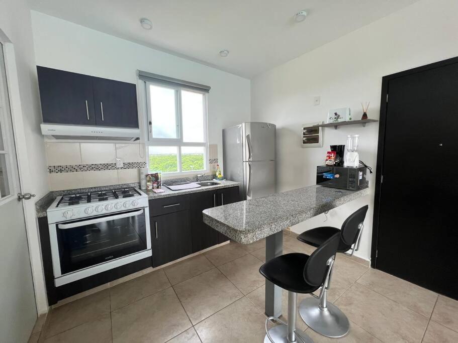 Apartamento лагуна. прохладная. с бассейном, 15 мин от моря Cancún