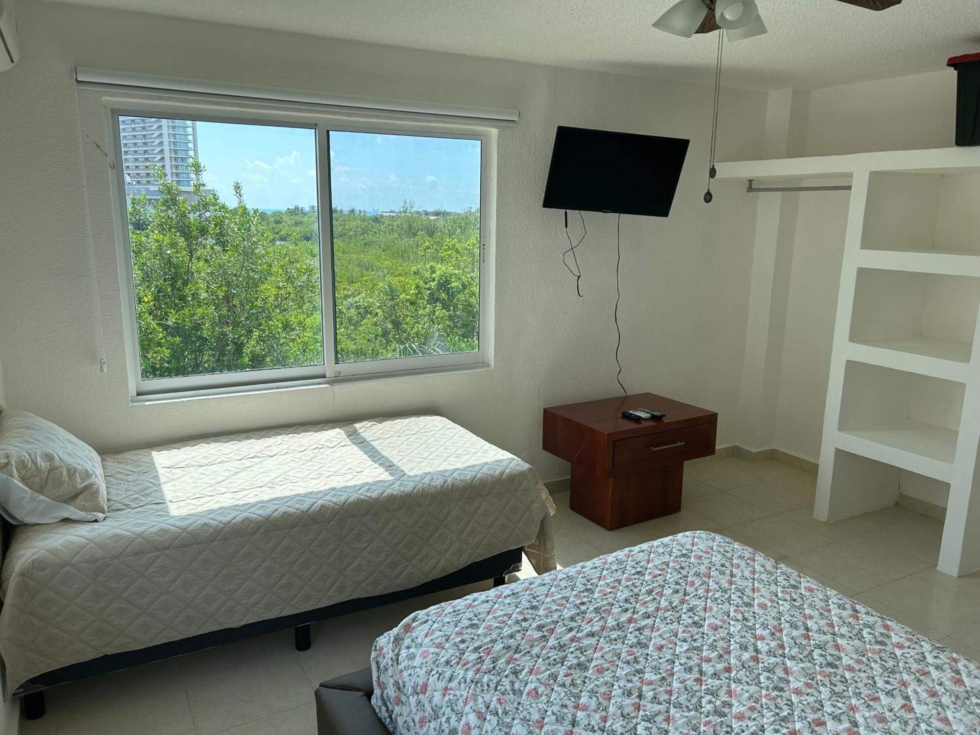 Habitación en casa particular Estudio Con Bano Privado Tres Personas En Puerto Cancún